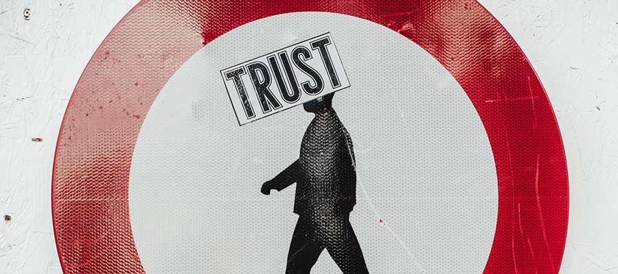 A sign that reads: "Trust".