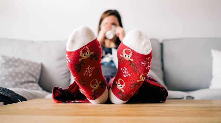 Woman Wearing Christmas Socks hd wallpaper desktop high-resolution background